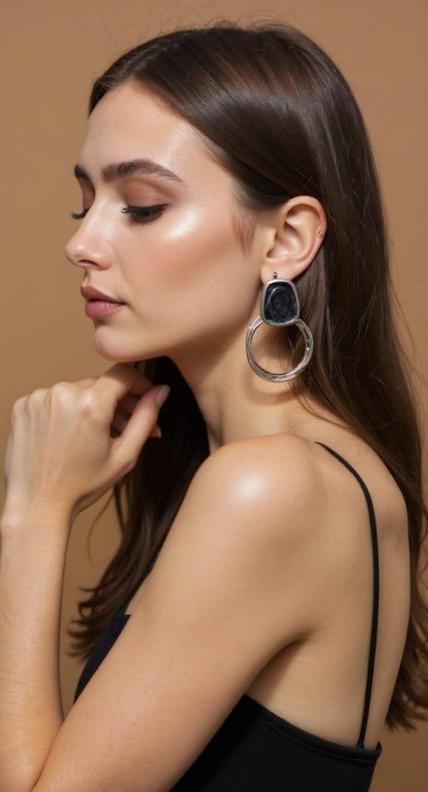 Elegant Silver Hoop Earrings with Black Stone